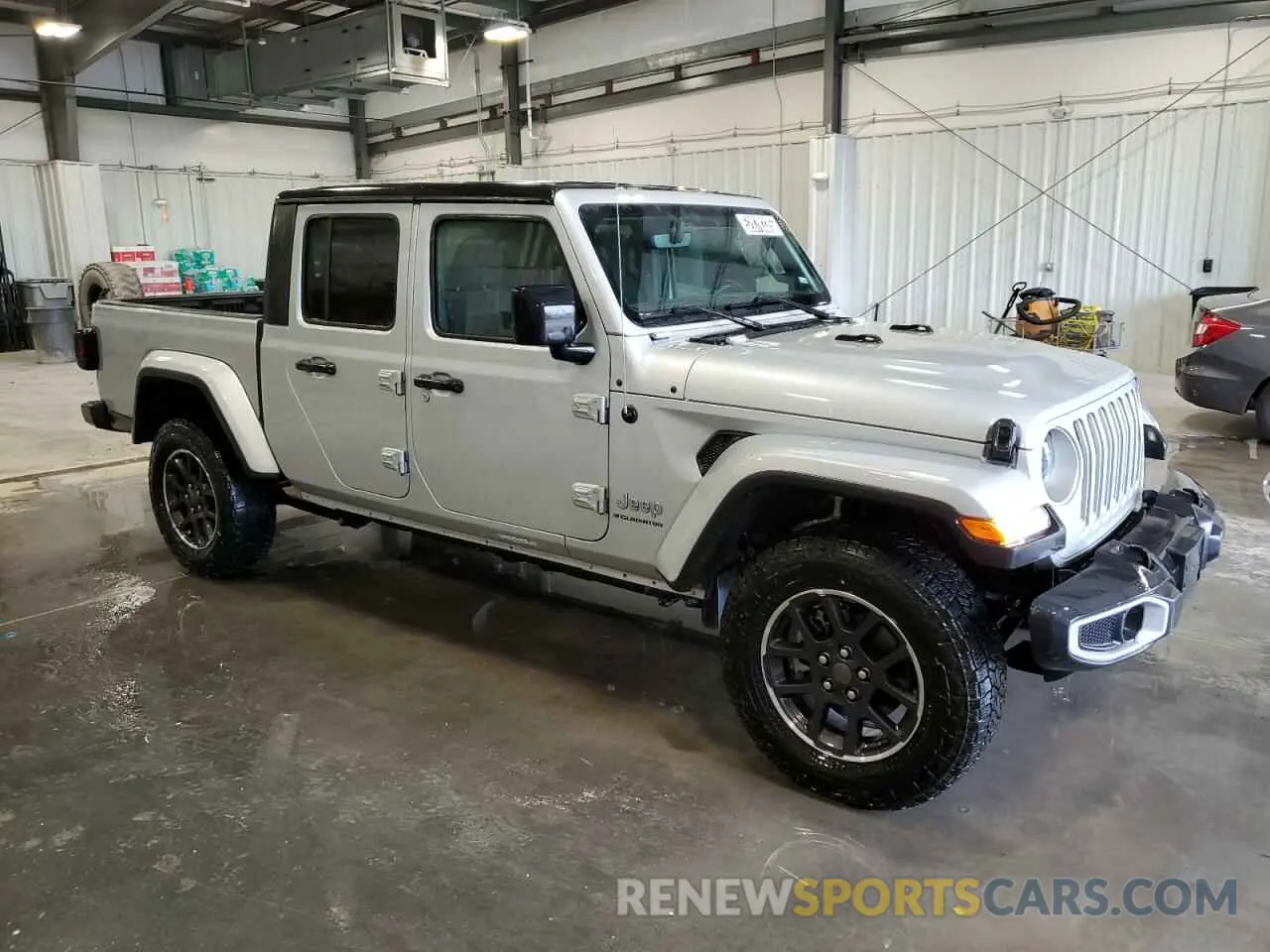 4 Photograph of a damaged car 1C6HJTFG9PL559892 JEEP GLADIATOR 2023