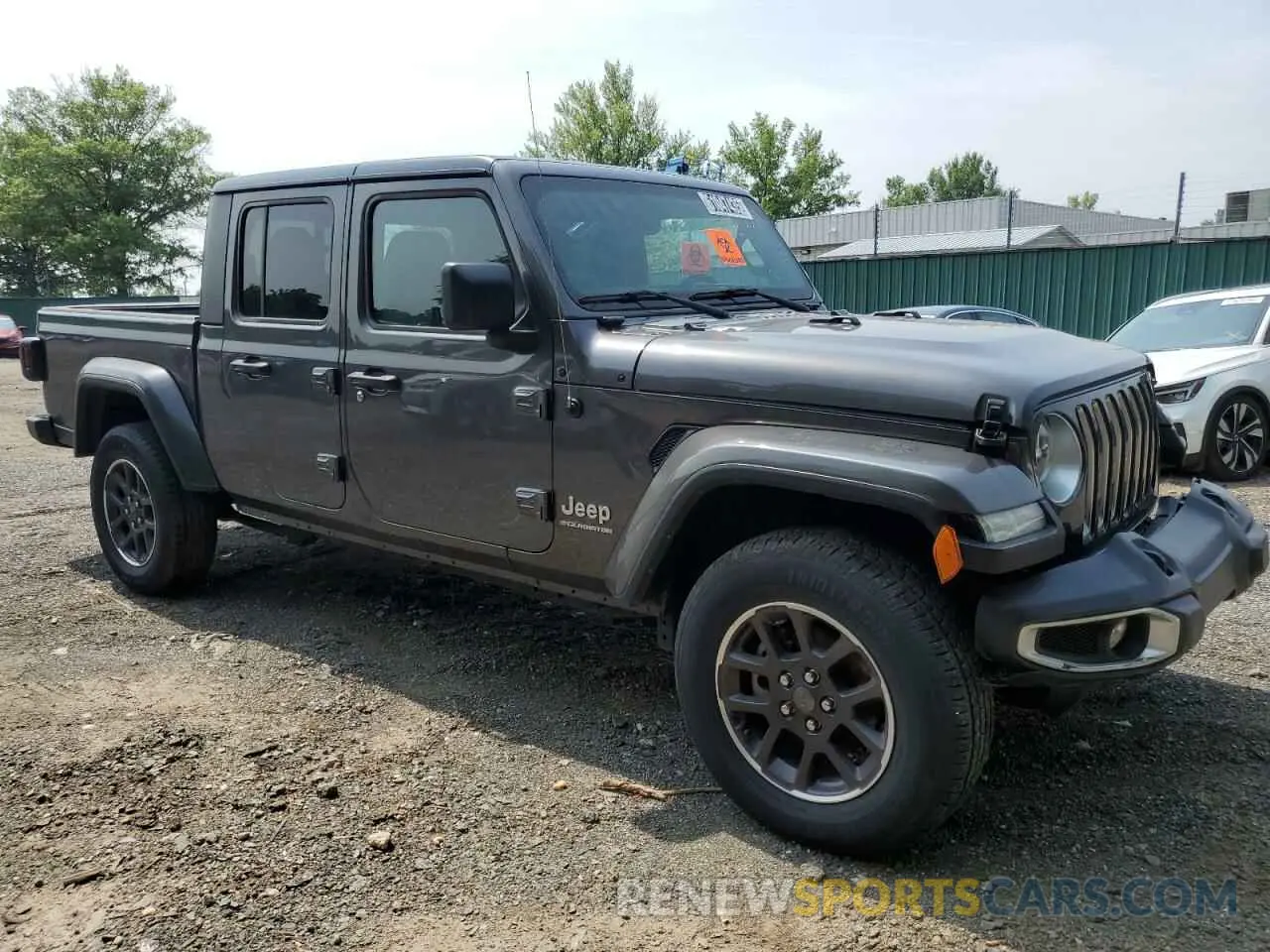 4 Photograph of a damaged car 1C6HJTFGXPL523659 JEEP GLADIATOR 2023