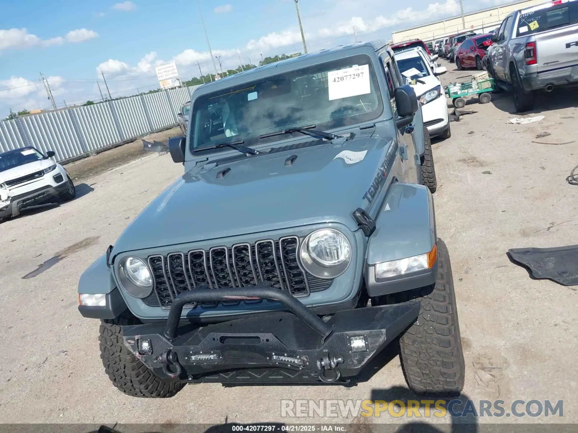 12 Фотография поврежденного автомобиля 1C6HJTAG4RL133974 JEEP GLADIATOR 2024