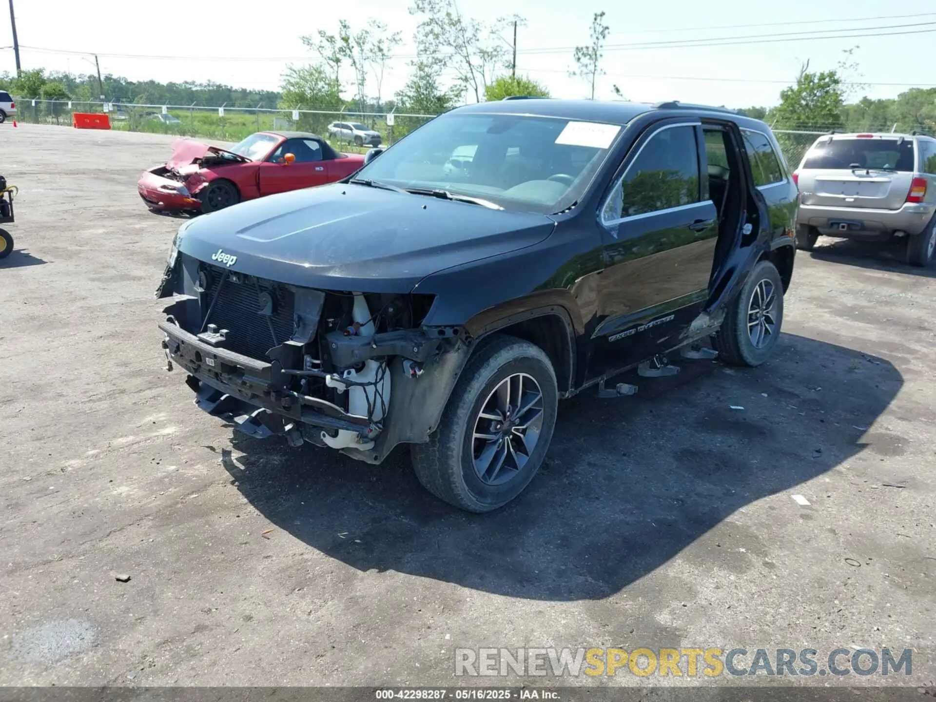 2 Photograph of a damaged car 1C4RJFAGXLC219294 JEEP GRAND CHEROKEE 2020