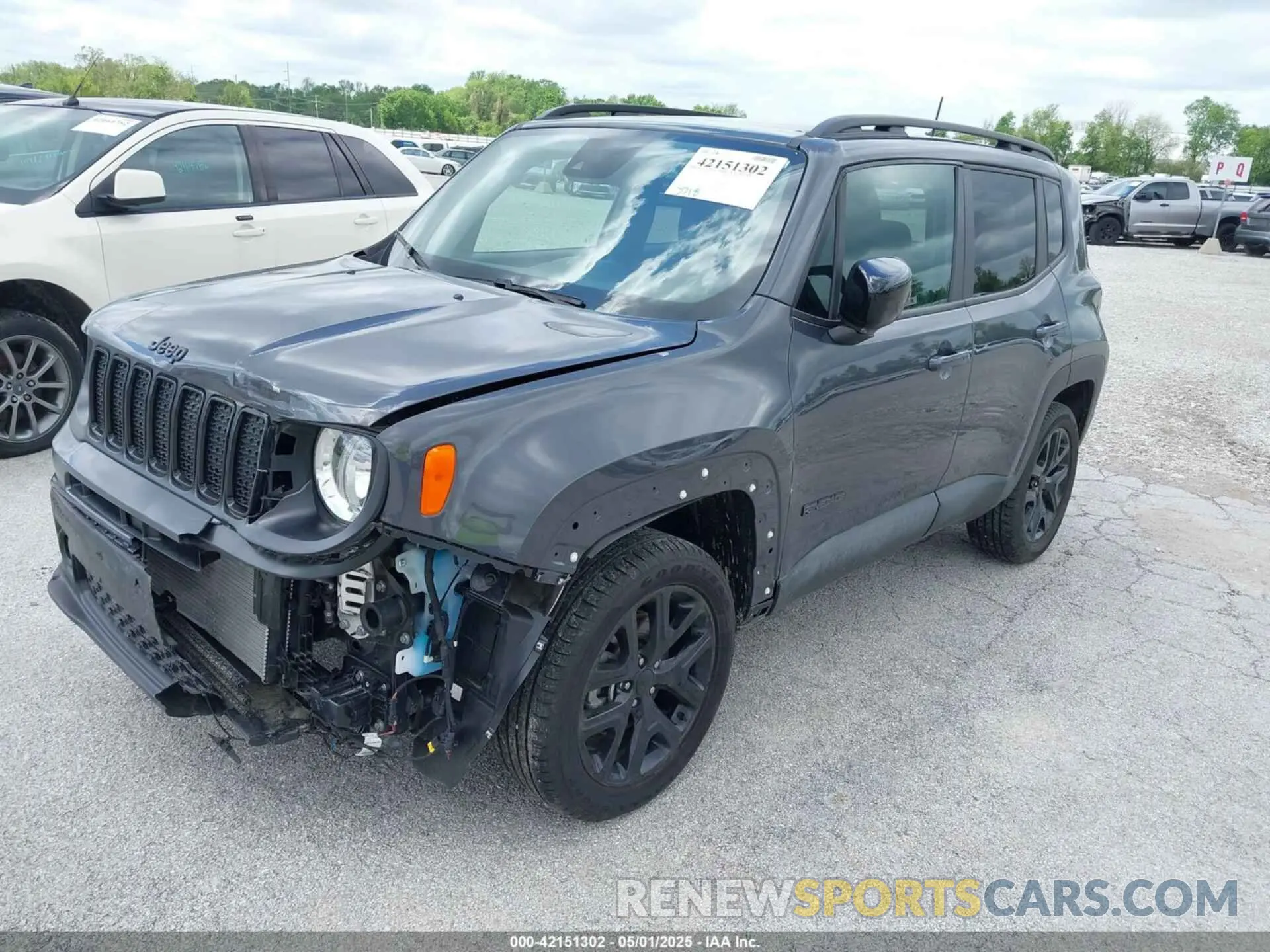 2 Photograph of a damaged car ZACNJDE14PPP10533 JEEP RENEGADE 2023