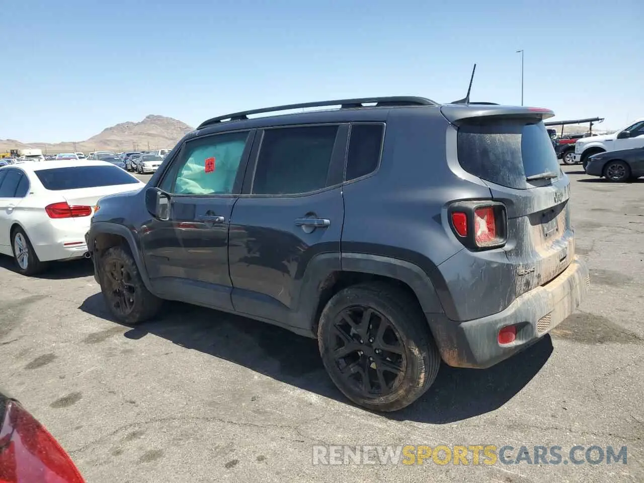 2 Photograph of a damaged car ZACNJDE14PPP17840 JEEP RENEGADE 2023