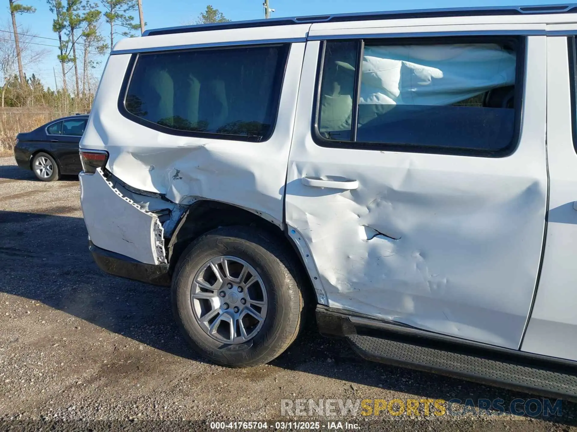 6 Photograph of a damaged car 1C4SJUAT5PS509425 JEEP WAGONEER 2023