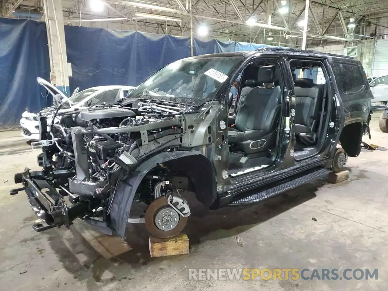 1 Photograph of a damaged car 1C4SJVBPXRS108401 JEEP WAGONEER 2024