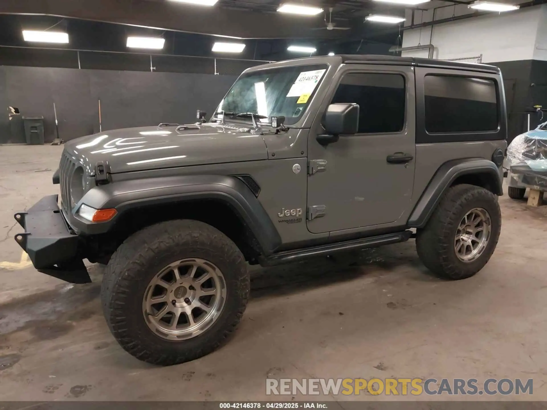 2 Фотография поврежденного автомобиля 1C4GJXAN4KW545438 JEEP WRANGLER 2019