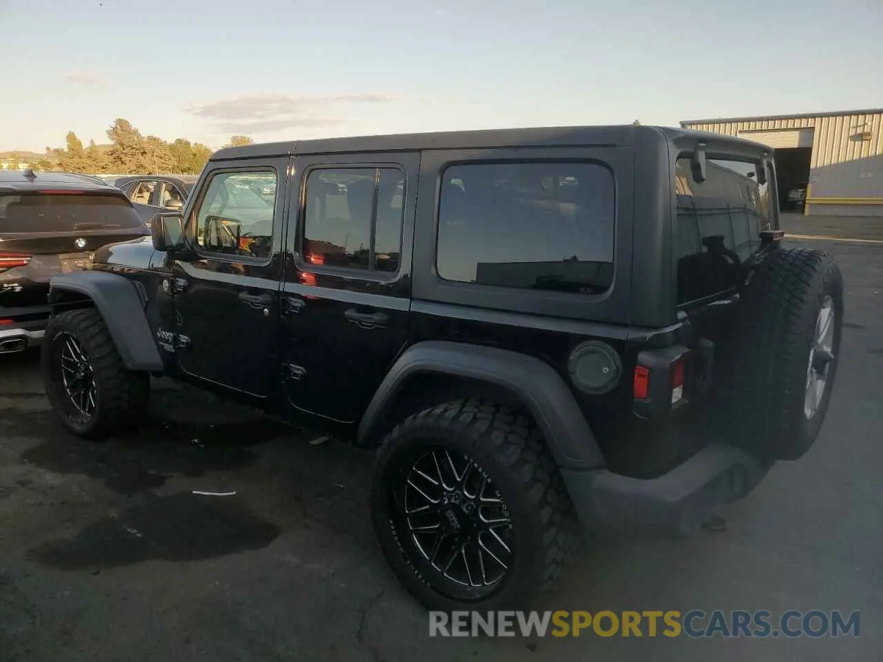 2 Photograph of a damaged car 1C4HJXDN5MW636897 JEEP WRANGLER 2021