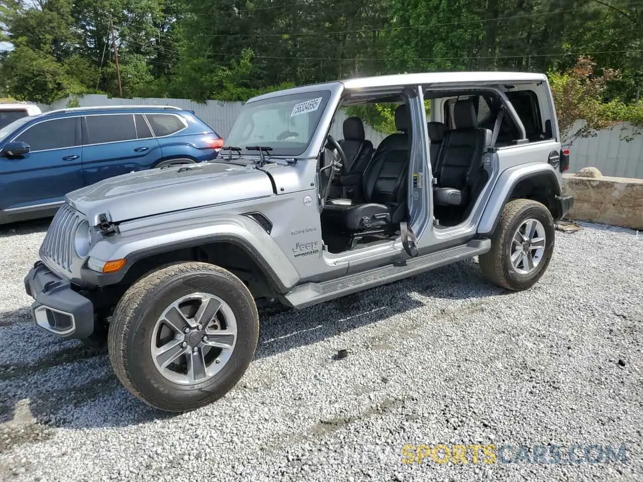 1 Photograph of a damaged car 1C4HJXEN3MW691220 JEEP WRANGLER 2021