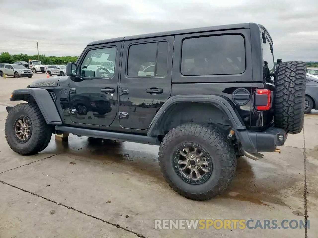 2 Photograph of a damaged car 1C4JJXSJ0MW735810 JEEP WRANGLER 2021