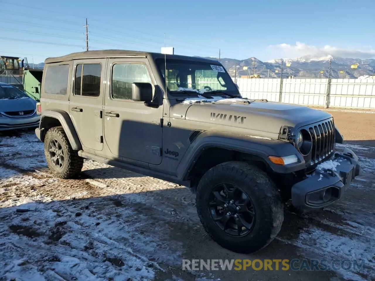 4 Photograph of a damaged car 1C4HJXDN6NW142016 JEEP WRANGLER 2022