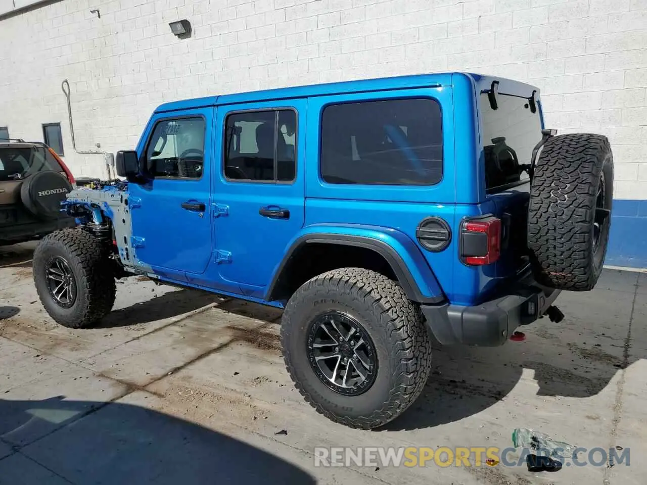 2 Photograph of a damaged car 1C4RJXFN4SW536904 JEEP WRANGLER 2025