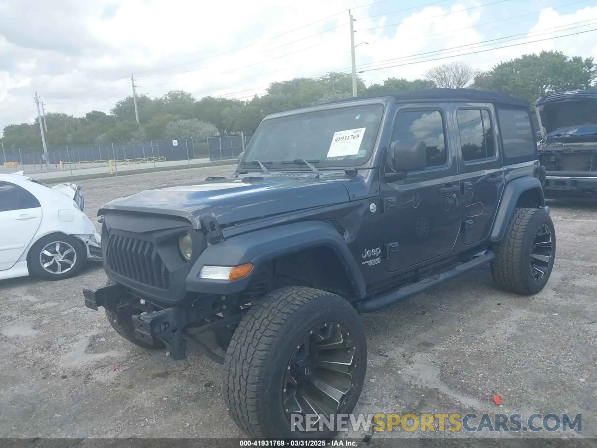 2 Photograph of a damaged car 1C4HJXDG6KW539951 JEEP WRANGLER UNLIMITED 2019