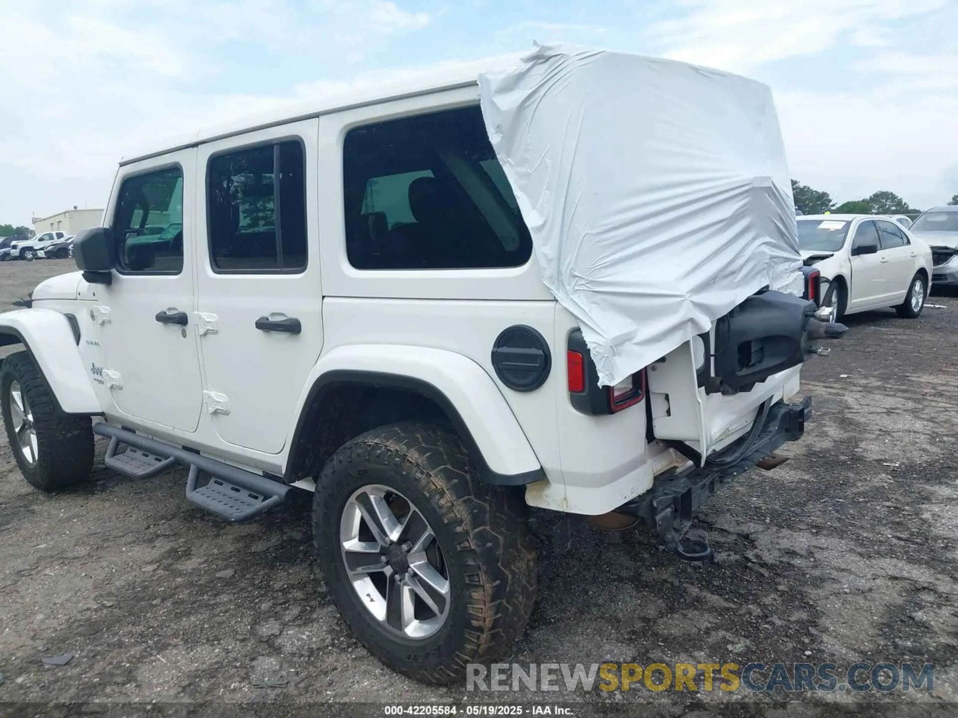 3 Photograph of a damaged car 1C4HJXEN2KW558851 JEEP WRANGLER UNLIMITED 2019