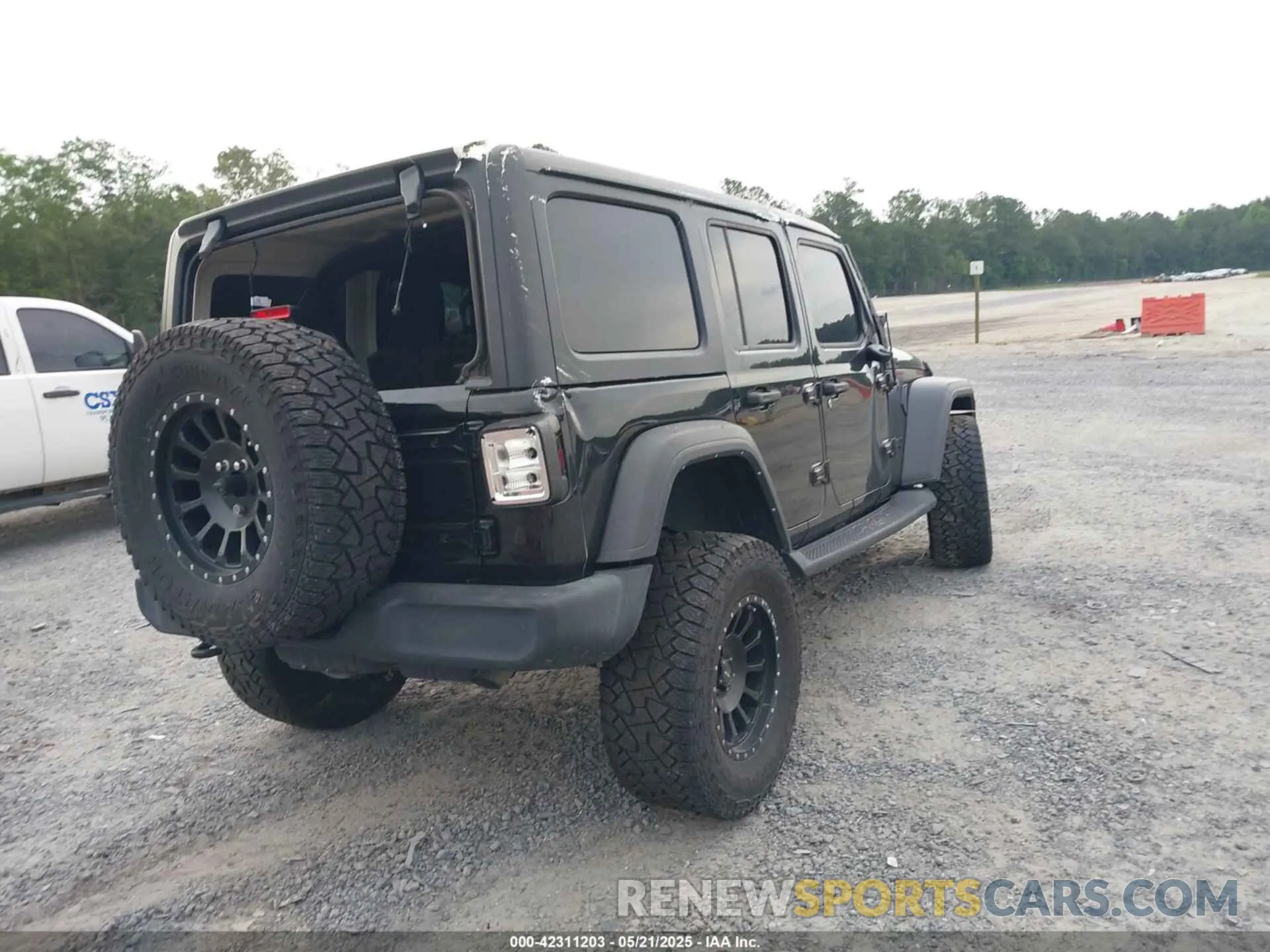 4 Photograph of a damaged car 1C4HJXDM5MW859724 JEEP WRANGLER UNLIMITED 2021
