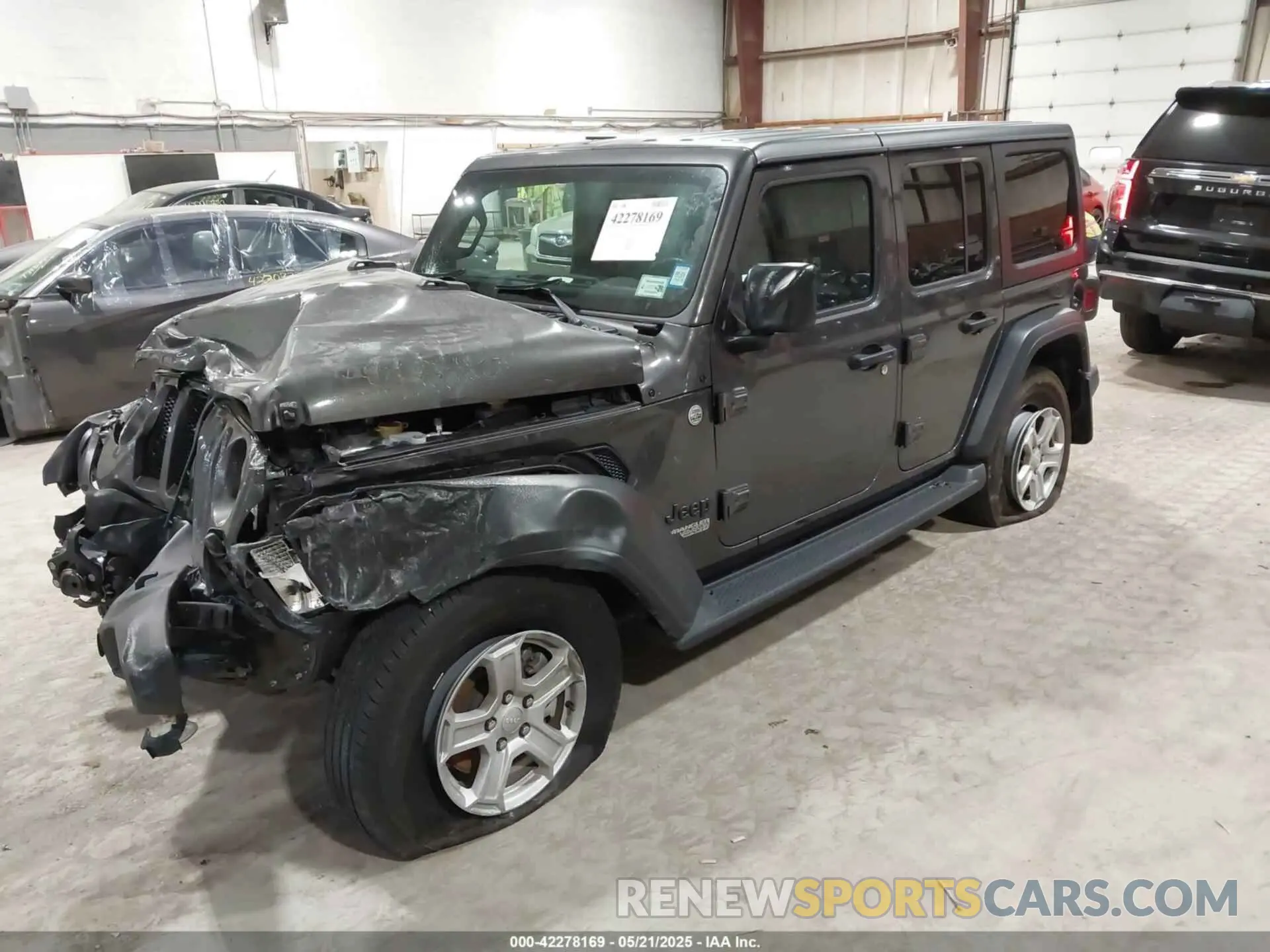 2 Photograph of a damaged car 1C4HJXDN2MW701625 JEEP WRANGLER UNLIMITED 2021