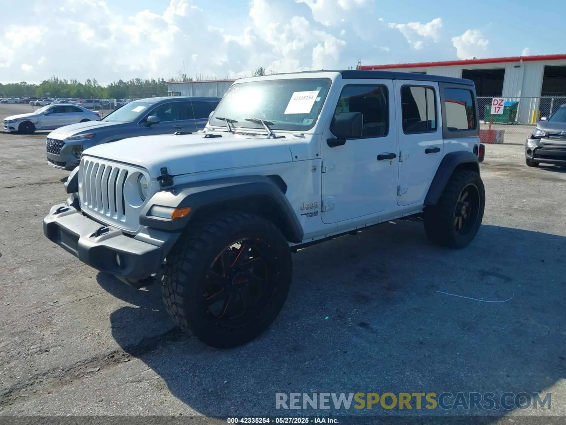 2 Photograph of a damaged car 1C4HJXDN7MW647934 JEEP WRANGLER UNLIMITED 2021