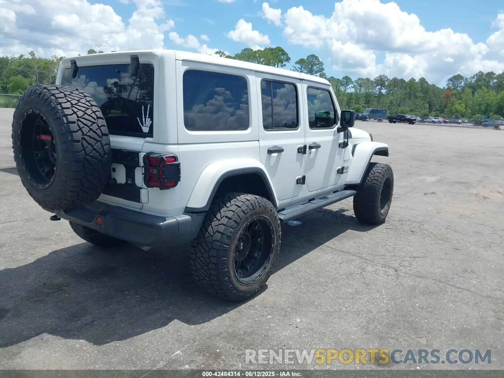 4 Photograph of a damaged car 1C4HJXEN7MW518395 JEEP WRANGLER UNLIMITED 2021