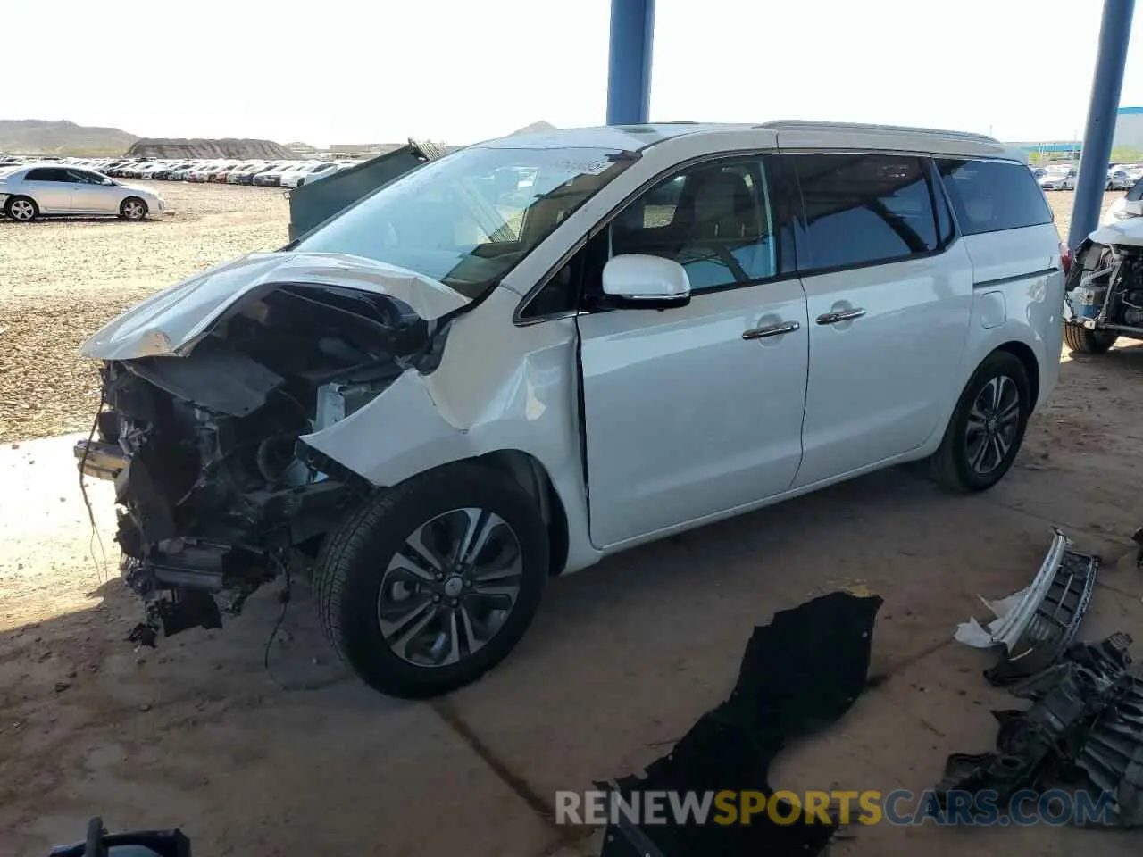 1 Photograph of a damaged car KNDMC5C11M6665437 KIA All Models 2021