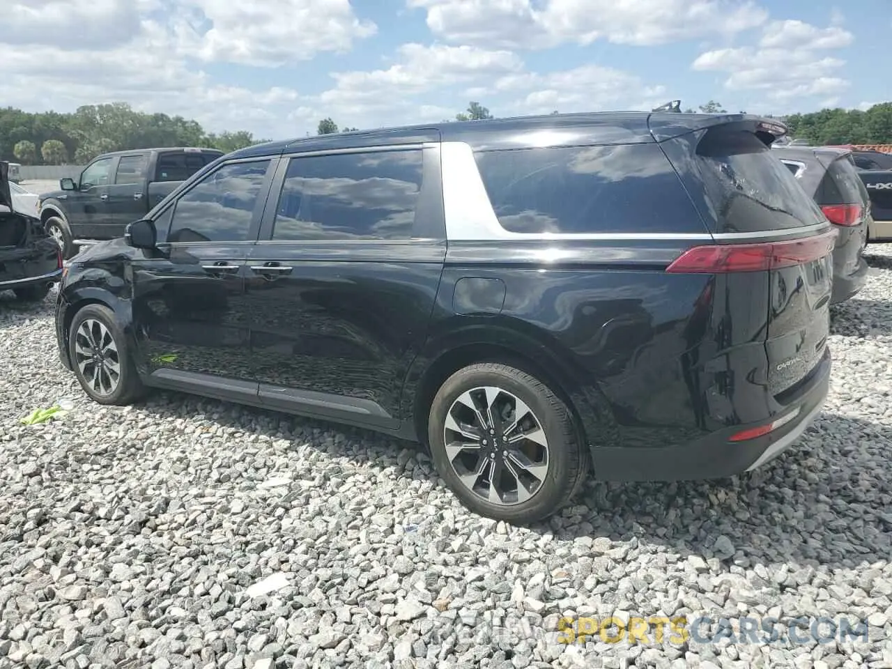 2 Фотография поврежденного автомобиля KNDNC5H39P6231933 KIA CARNIVAL E 2023
