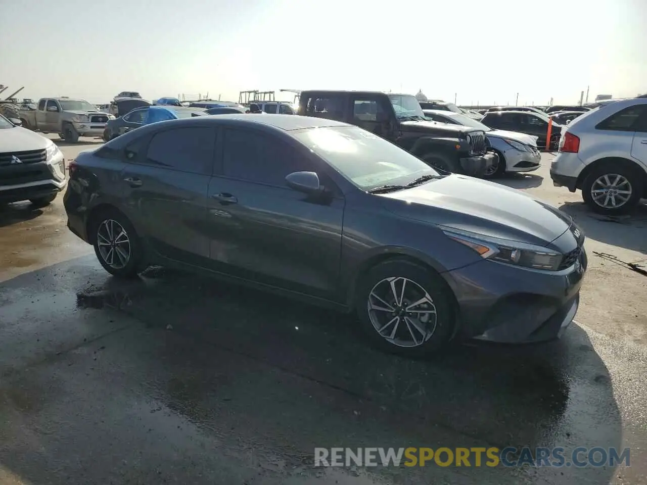 4 Photograph of a damaged car 3KPF24AD3NE460152 KIA FORTE 2022