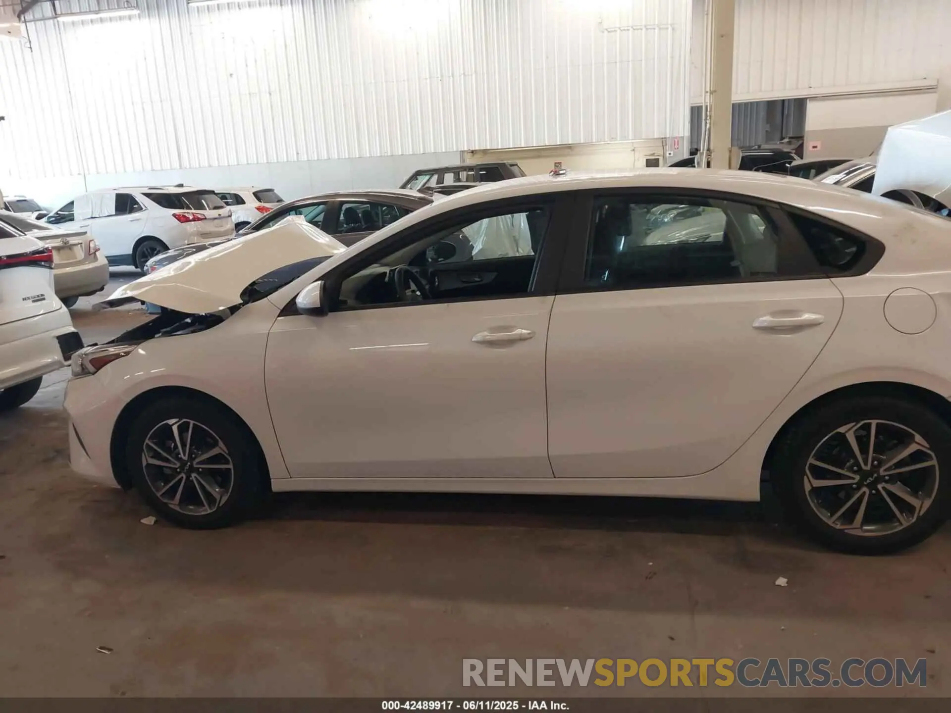 14 Photograph of a damaged car 3KPF24AD4NE431727 KIA FORTE 2022
