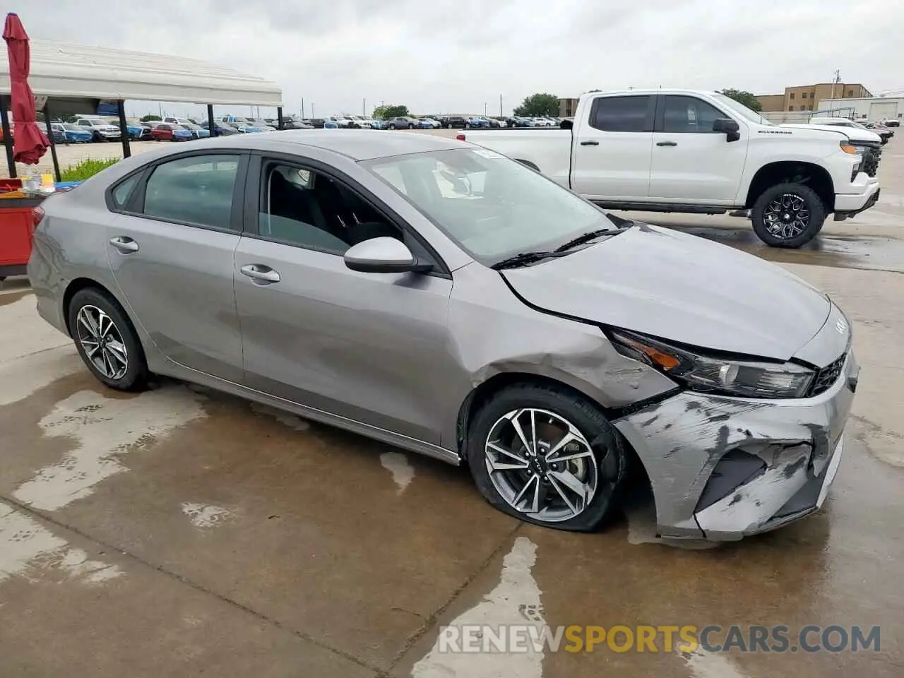 4 Photograph of a damaged car 3KPF24AD4PE627413 KIA FORTE 2023