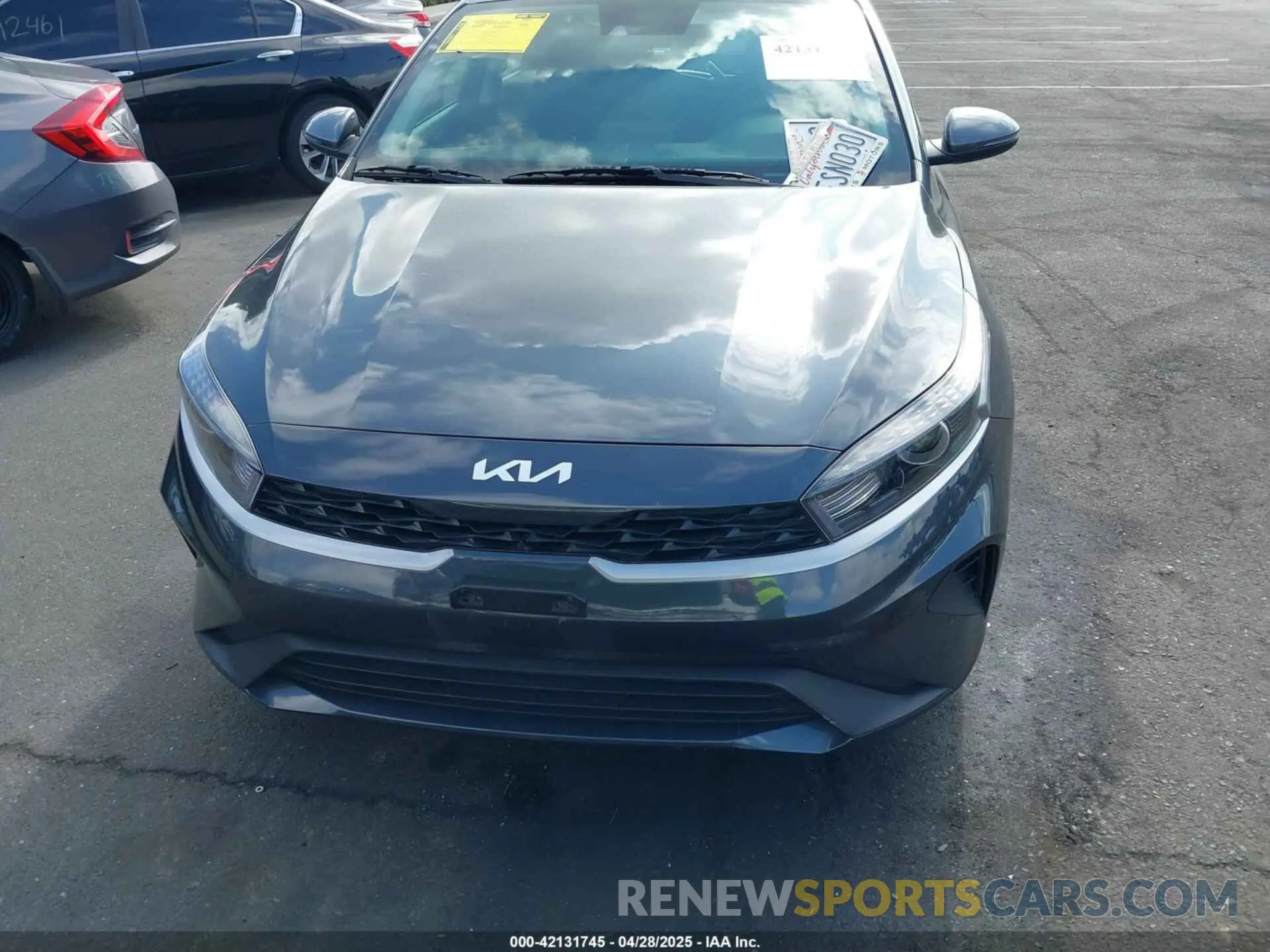 12 Photograph of a damaged car 3KPF24AD6PE578103 KIA FORTE 2023