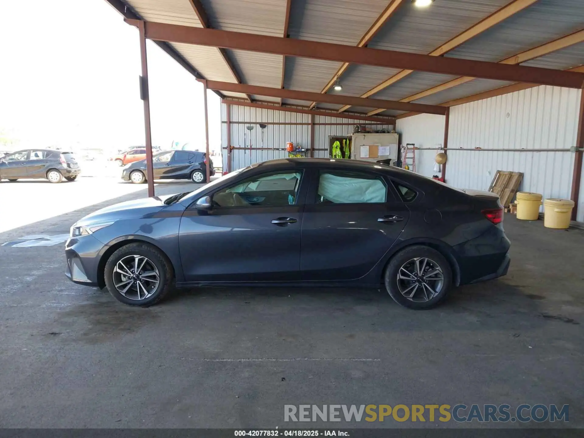 14 Photograph of a damaged car 3KPF24AD6PE590378 KIA FORTE 2023