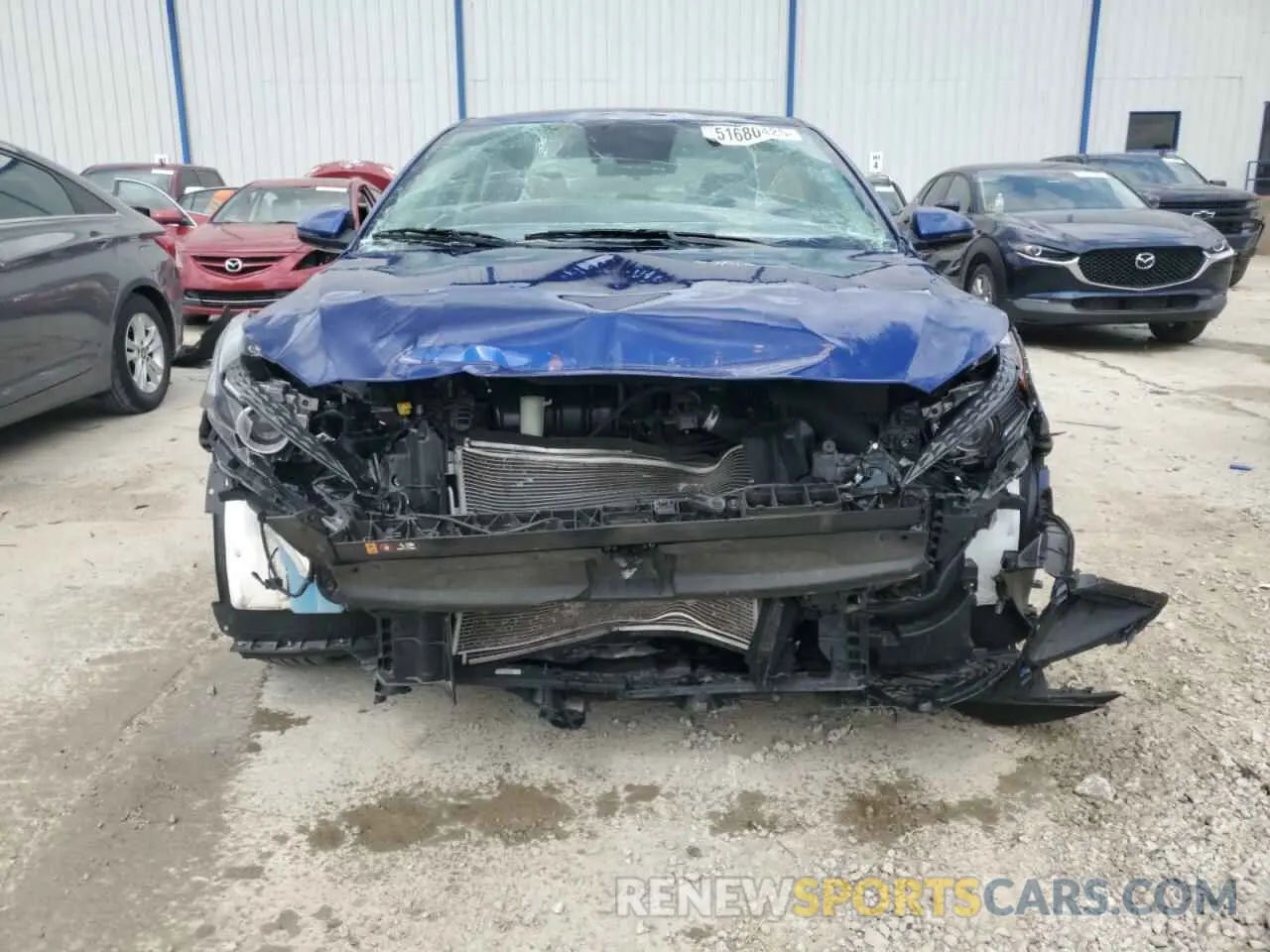 5 Photograph of a damaged car 3KPF24AD8PE585134 KIA FORTE 2023