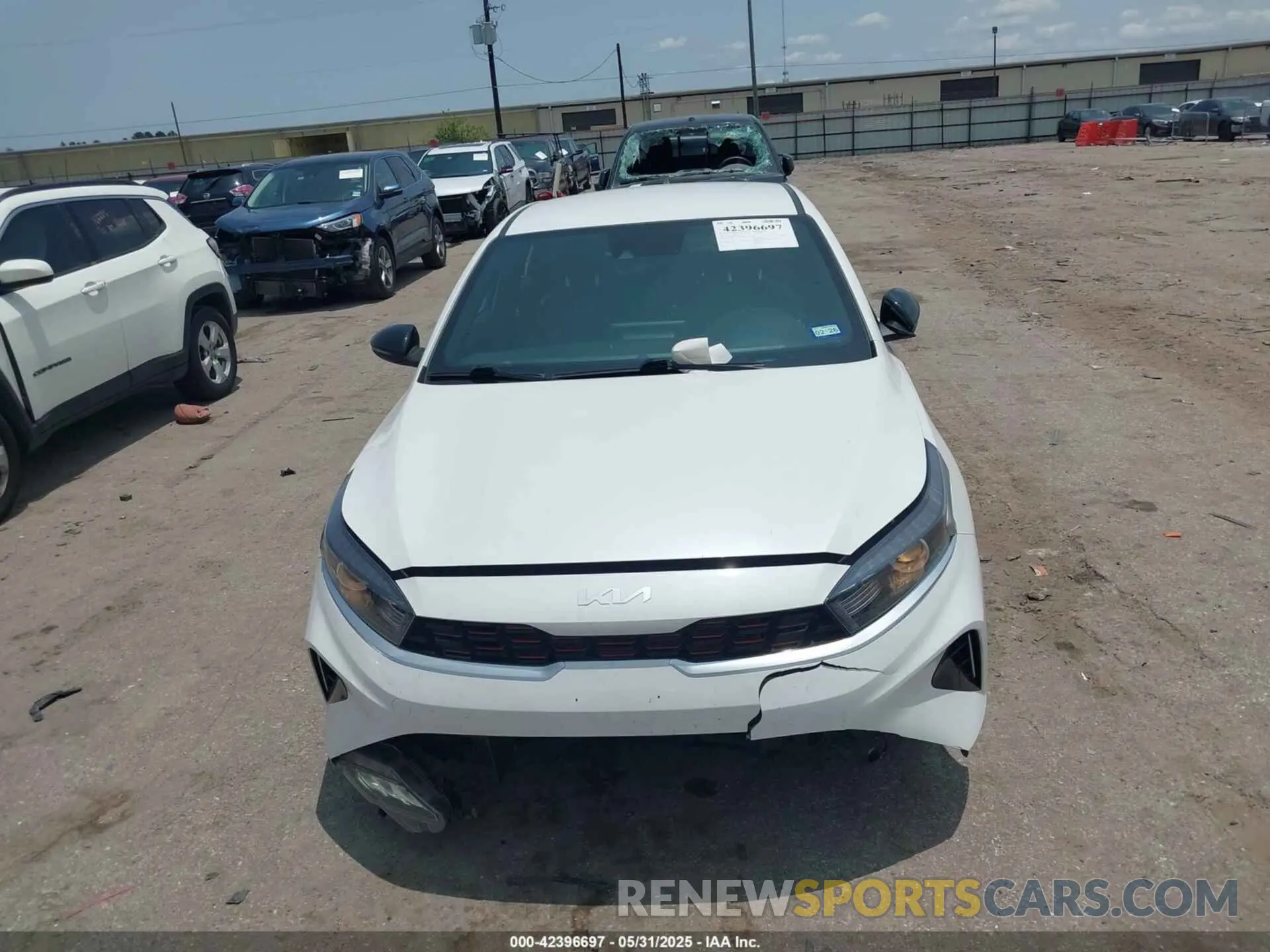 12 Photograph of a damaged car 3KPF54AD0PE548554 KIA FORTE 2023