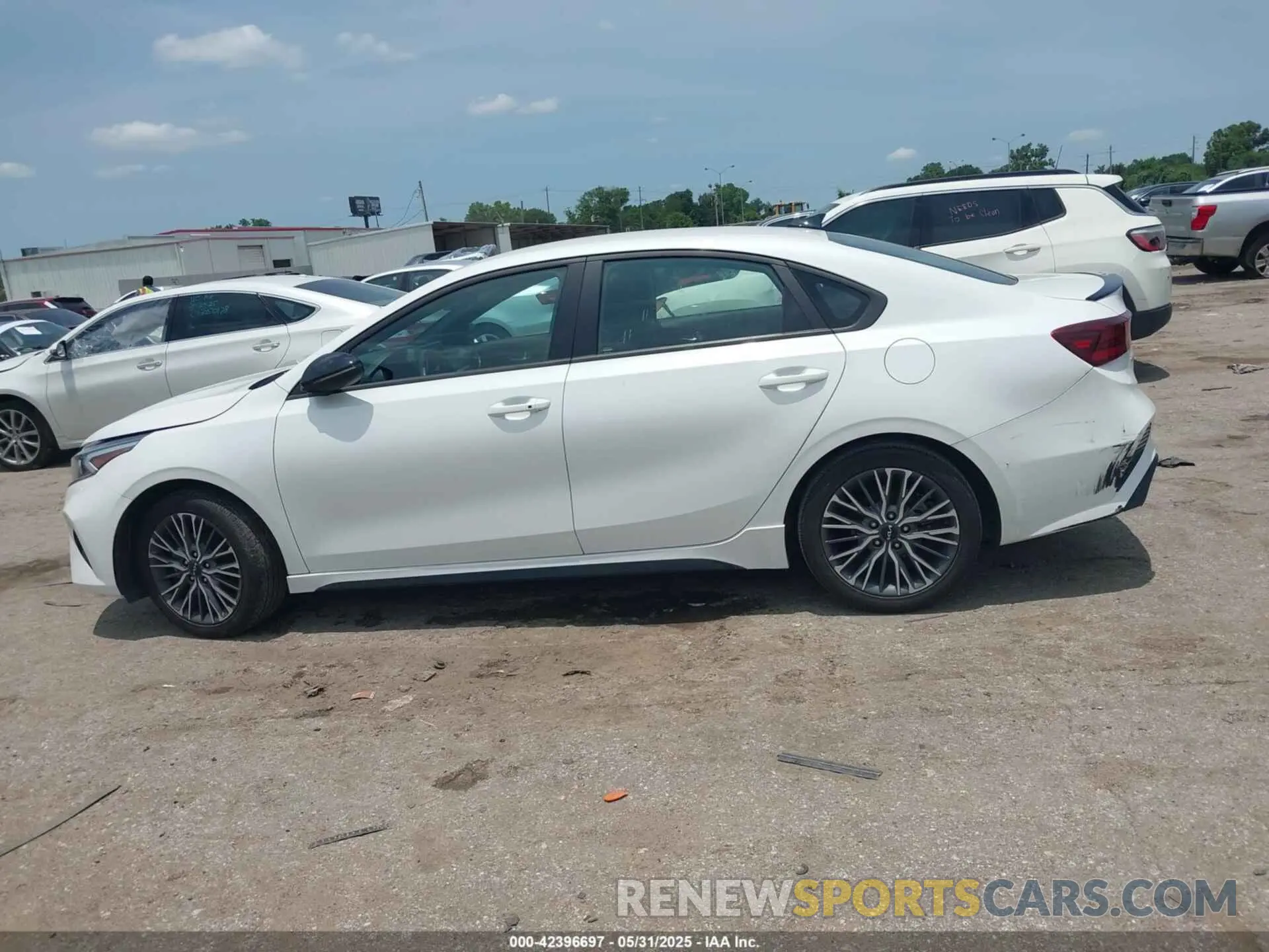 14 Photograph of a damaged car 3KPF54AD0PE548554 KIA FORTE 2023