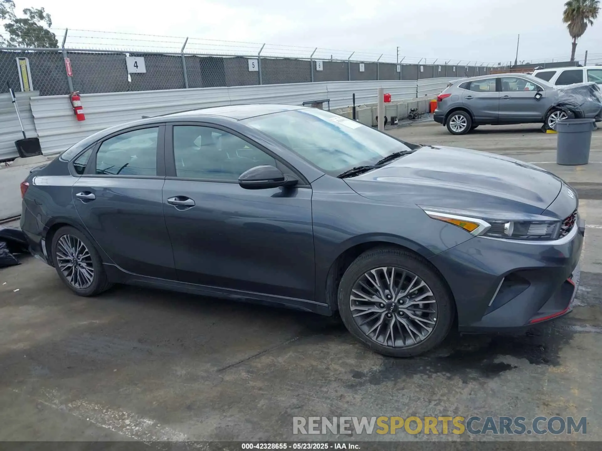 13 Photograph of a damaged car 3KPF54AD3PE666565 KIA FORTE 2023