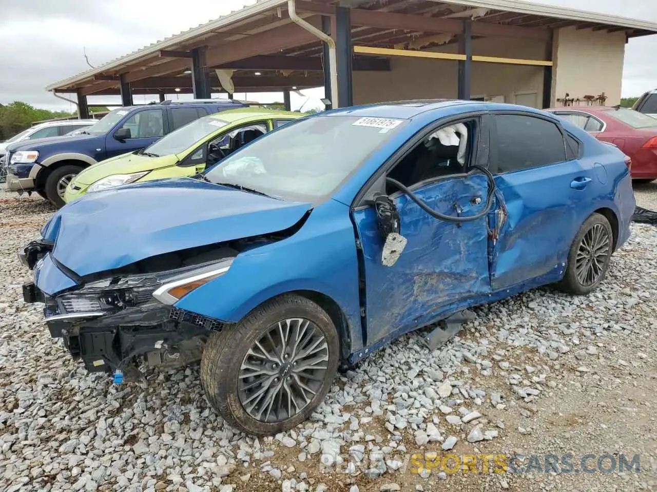 1 Photograph of a damaged car 3KPF54AD8PE528827 KIA FORTE 2023