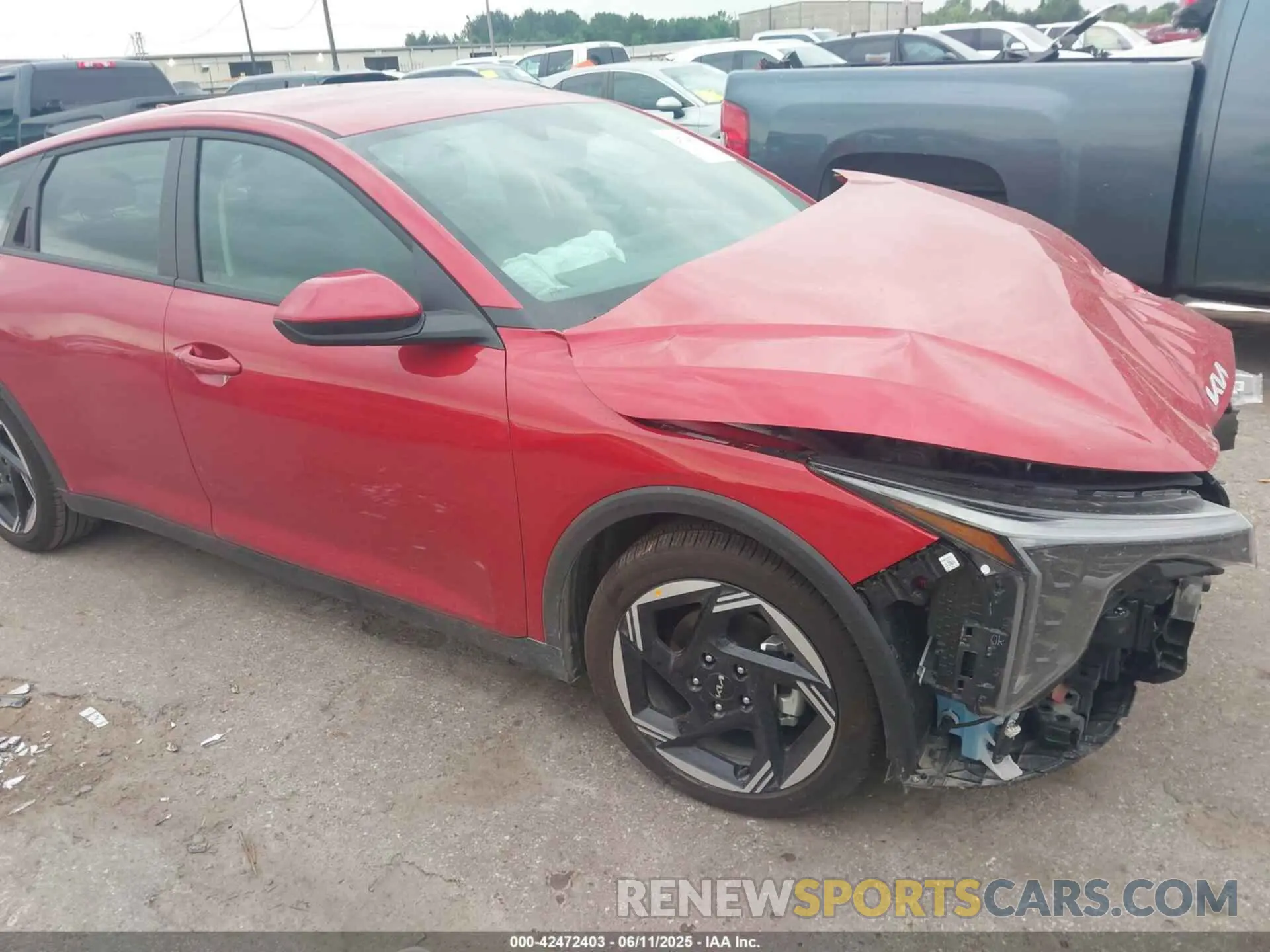 1 Photograph of a damaged car 3KPFU4DE2SE050260 KIA K4 2025