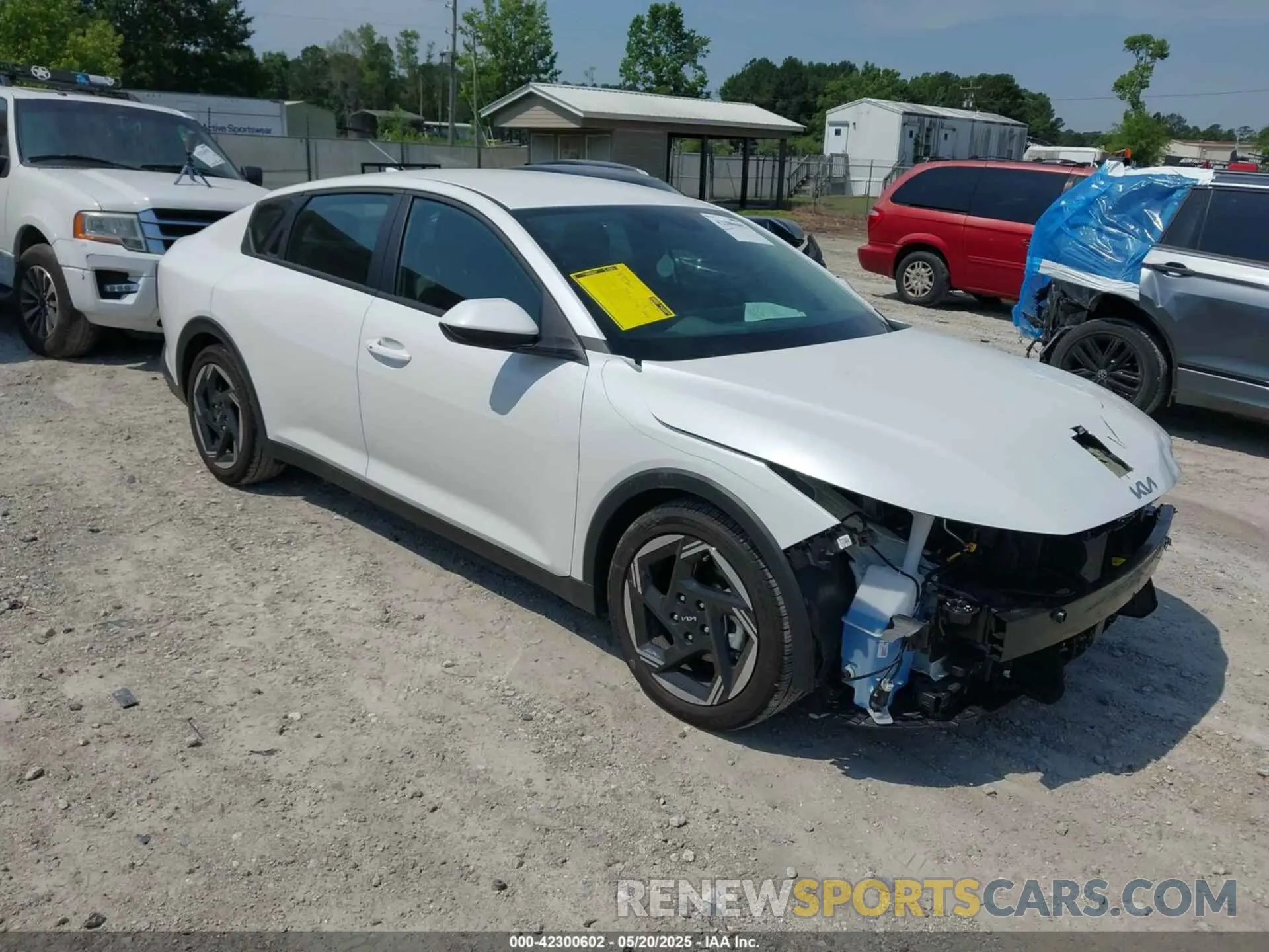 1 Photograph of a damaged car 3KPFU4DE8SE081867 KIA K4 2025