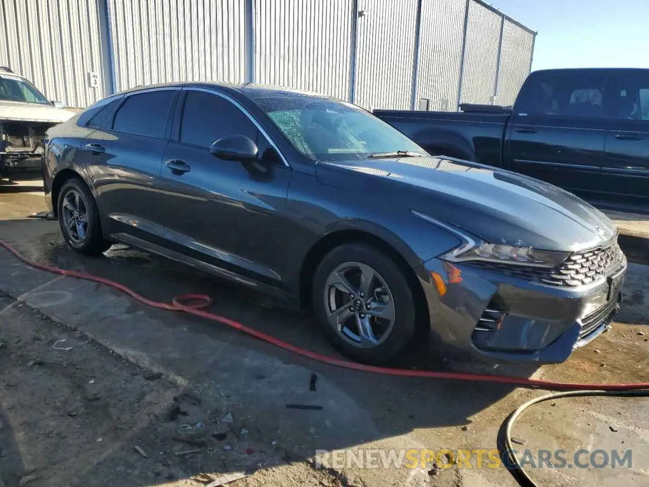 4 Photograph of a damaged car 5XXG14J22MG054892 KIA K5 2021