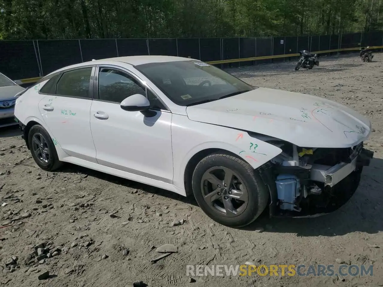 4 Photograph of a damaged car 5XXG14J23NG158759 KIA K5 2022
