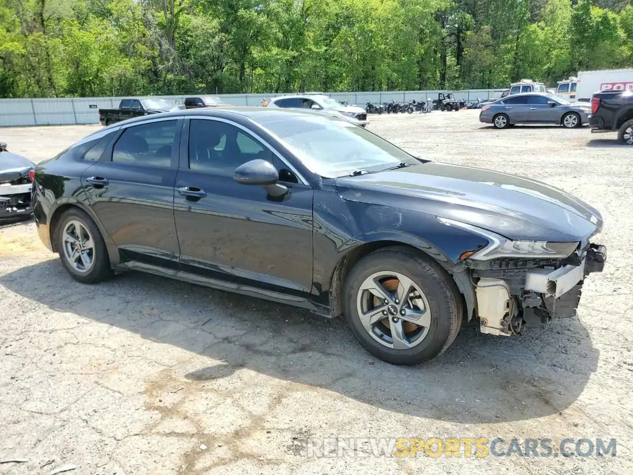 4 Photograph of a damaged car 5XXG14J27NG105966 KIA K5 2022