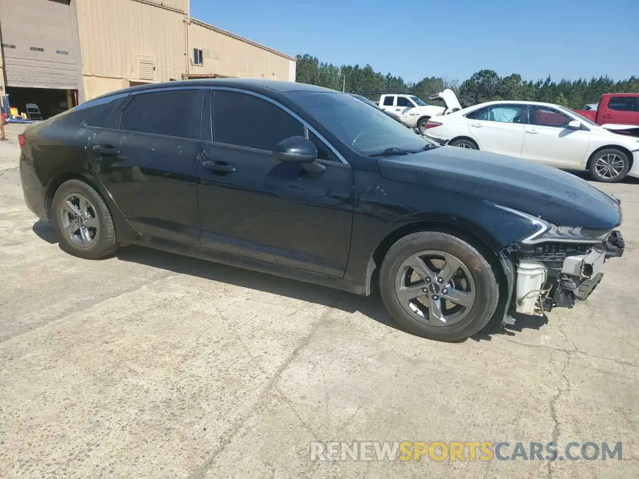 4 Photograph of a damaged car 5XXG14J27NG142547 KIA K5 2022