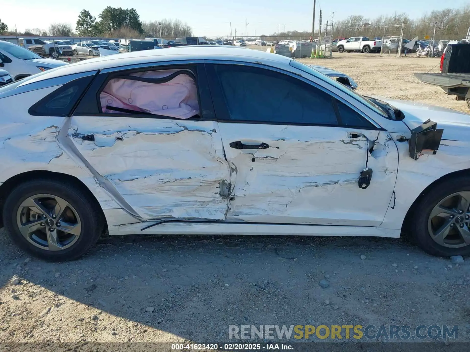 13 Photograph of a damaged car 5XXG14J28NG116006 KIA K5 2022