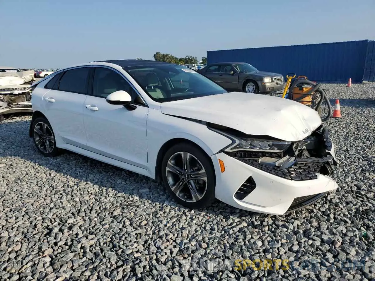 4 Photograph of a damaged car 5XXG34J28NG102830 KIA K5 2022