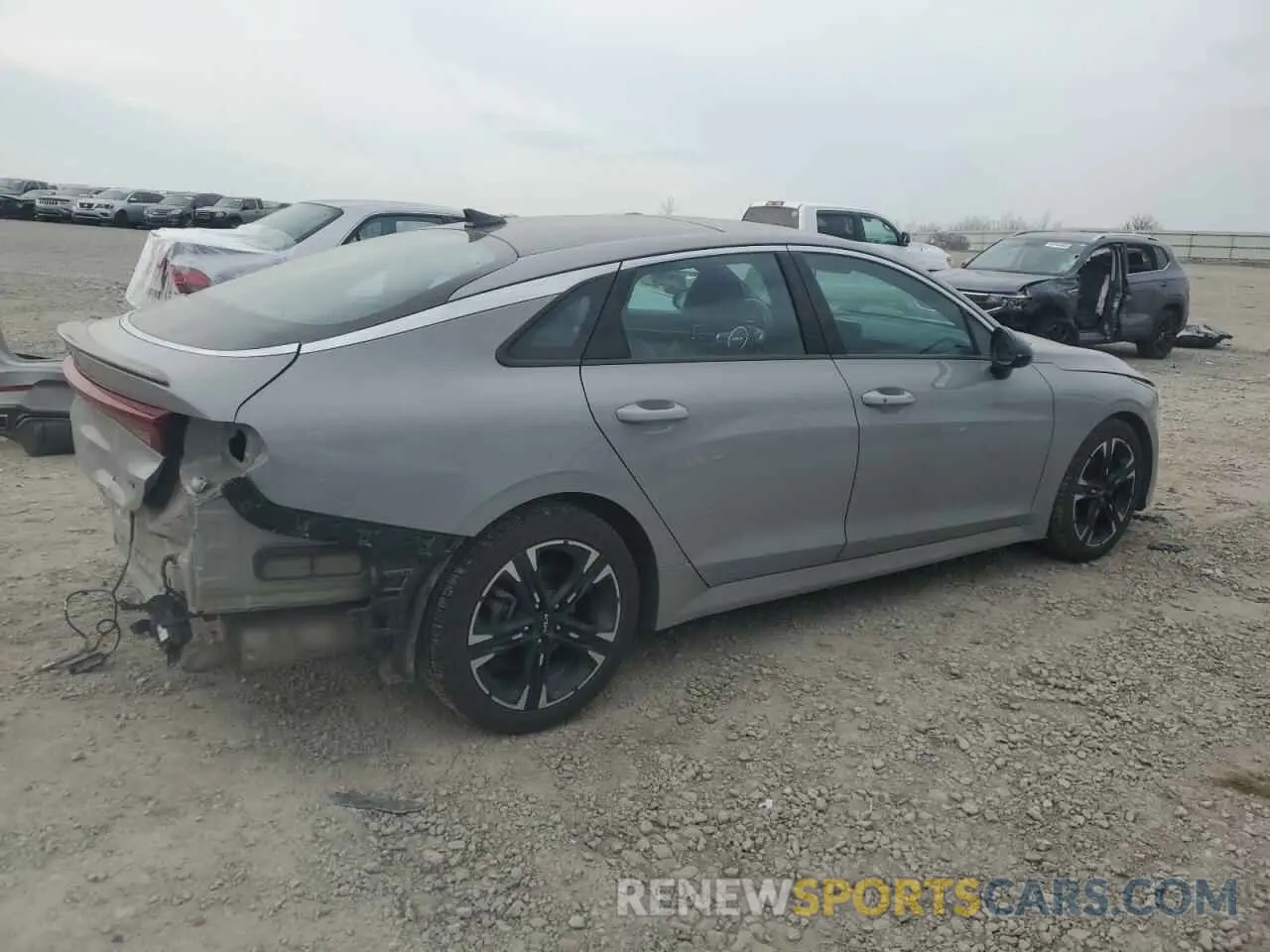 3 Photograph of a damaged car 5XXG64J20NG108998 KIA K5 2022