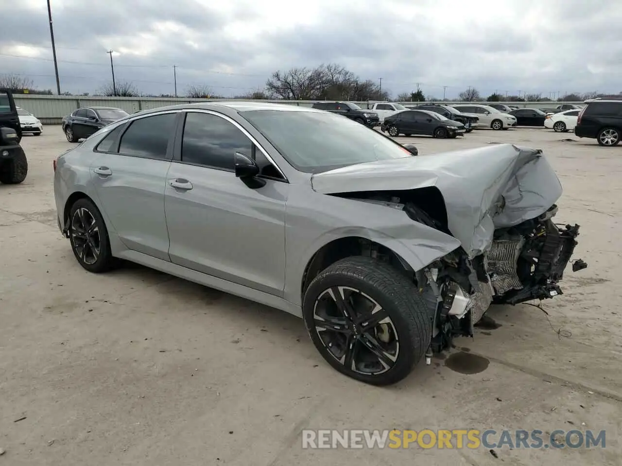 4 Photograph of a damaged car 5XXG64J20NG152368 KIA K5 2022