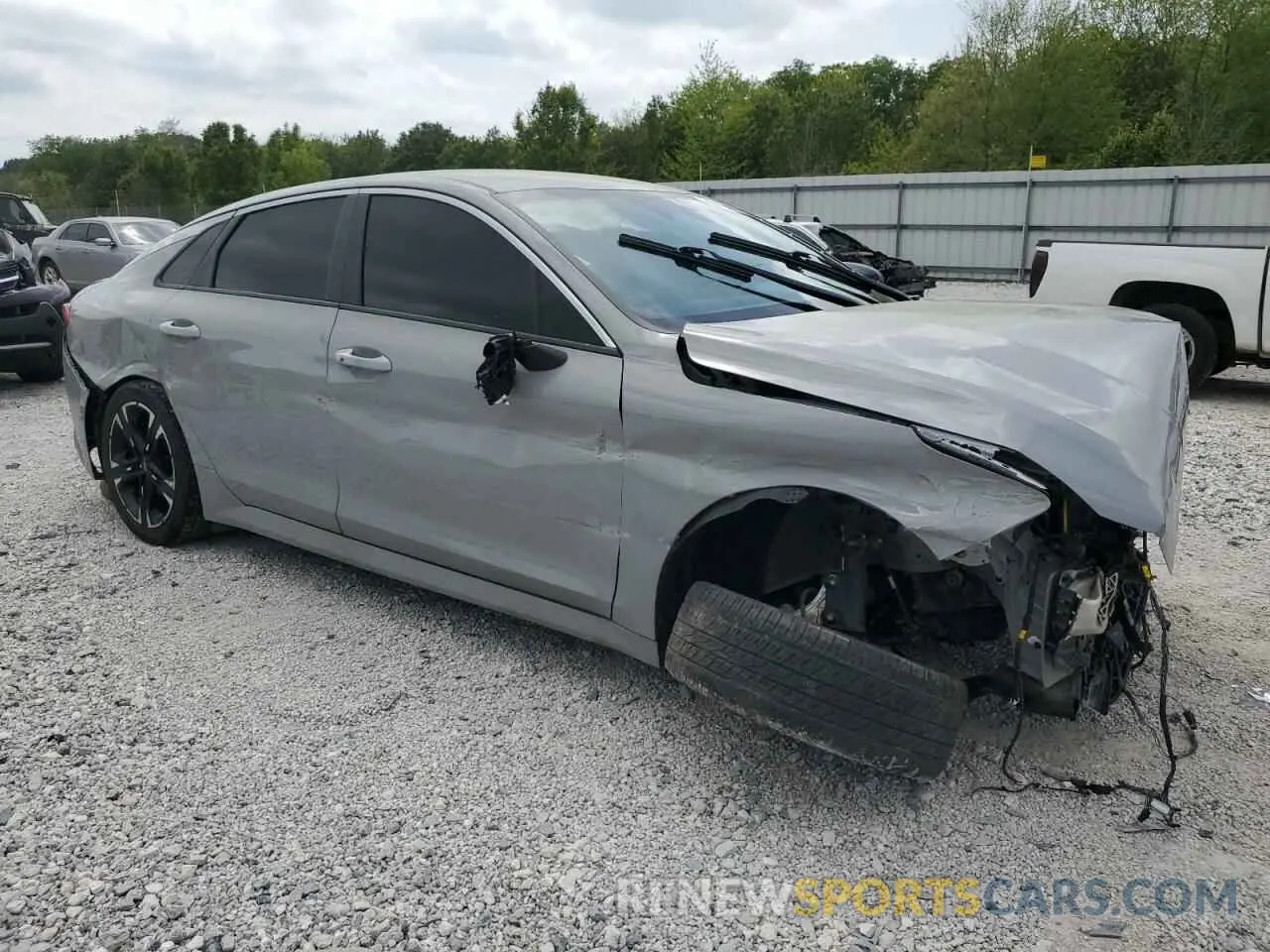 4 Photograph of a damaged car 5XXG64J21NG163475 KIA K5 2022