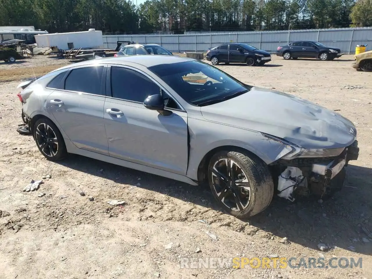 4 Photograph of a damaged car 5XXG64J25NG156304 KIA K5 2022