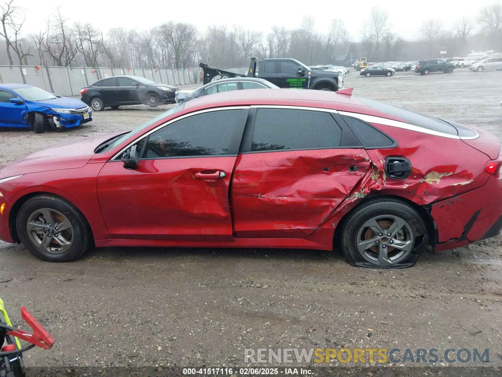 14 Photograph of a damaged car 5XXG14J29PG224931 KIA K5 2023