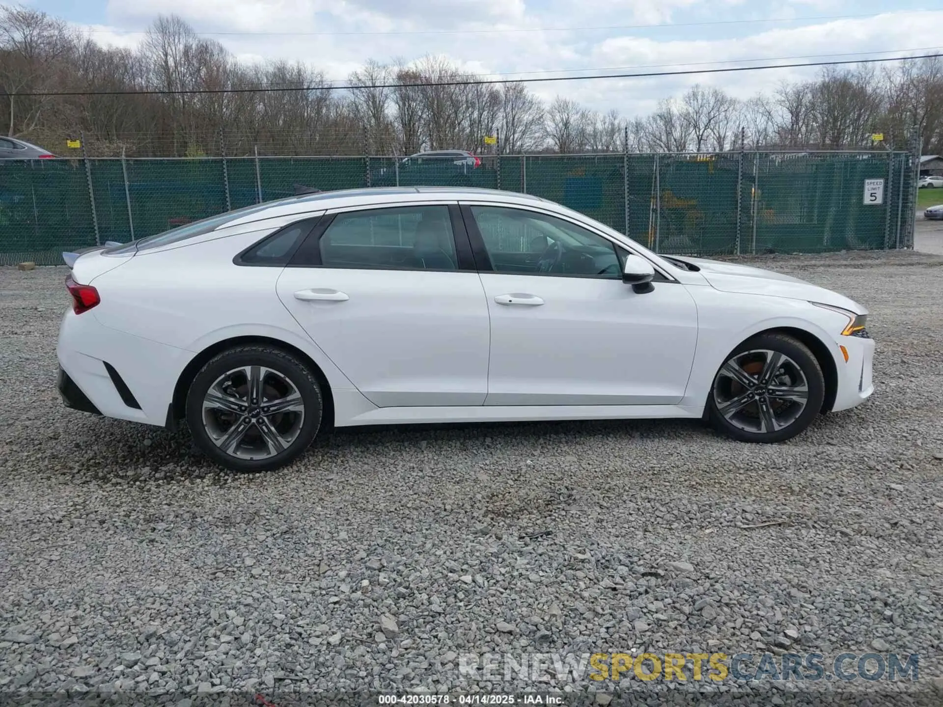 14 Photograph of a damaged car 5XXG34J22PG201579 KIA K5 2023