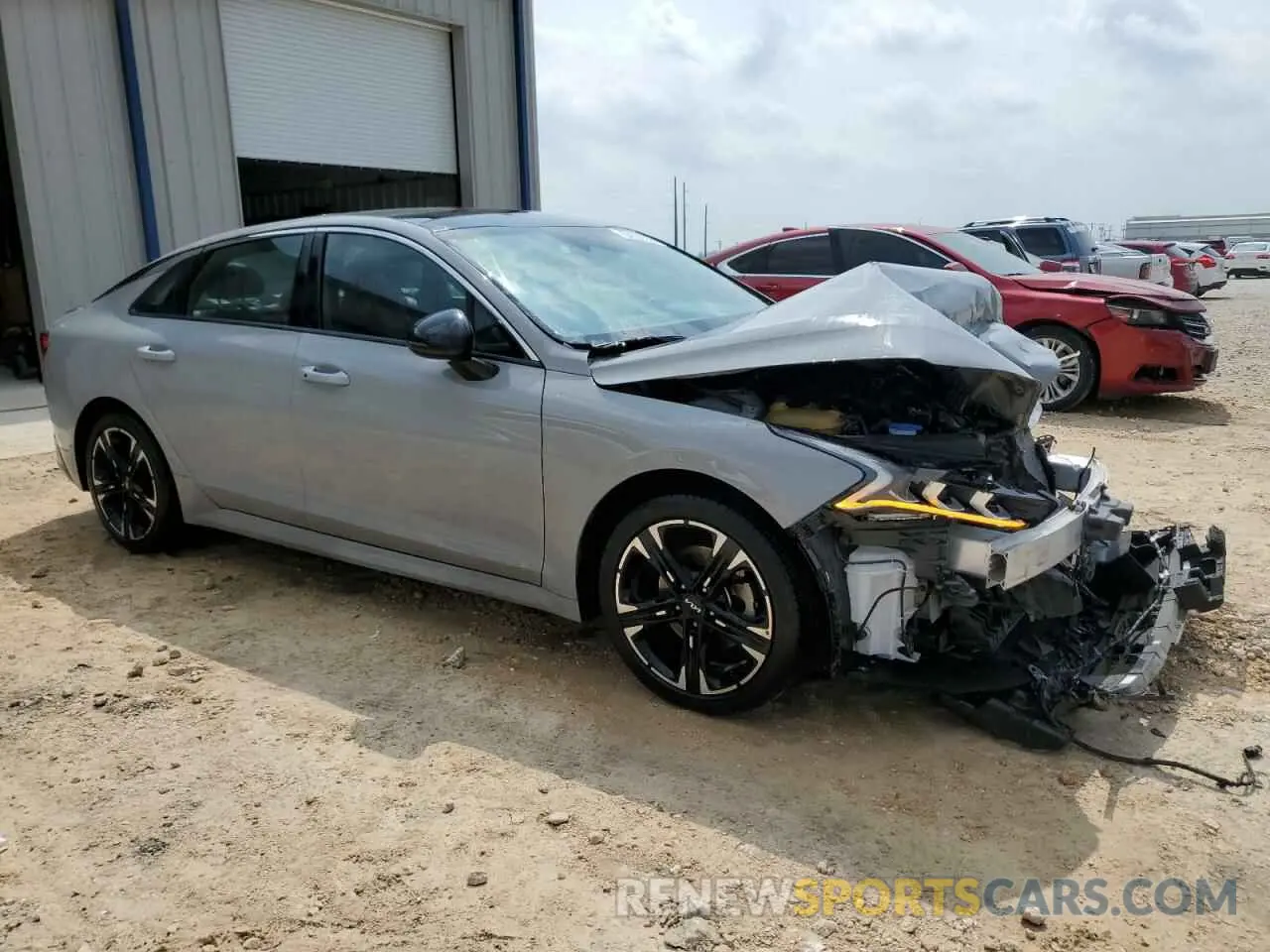 4 Photograph of a damaged car 5XXG64J28PG204879 KIA K5 2023