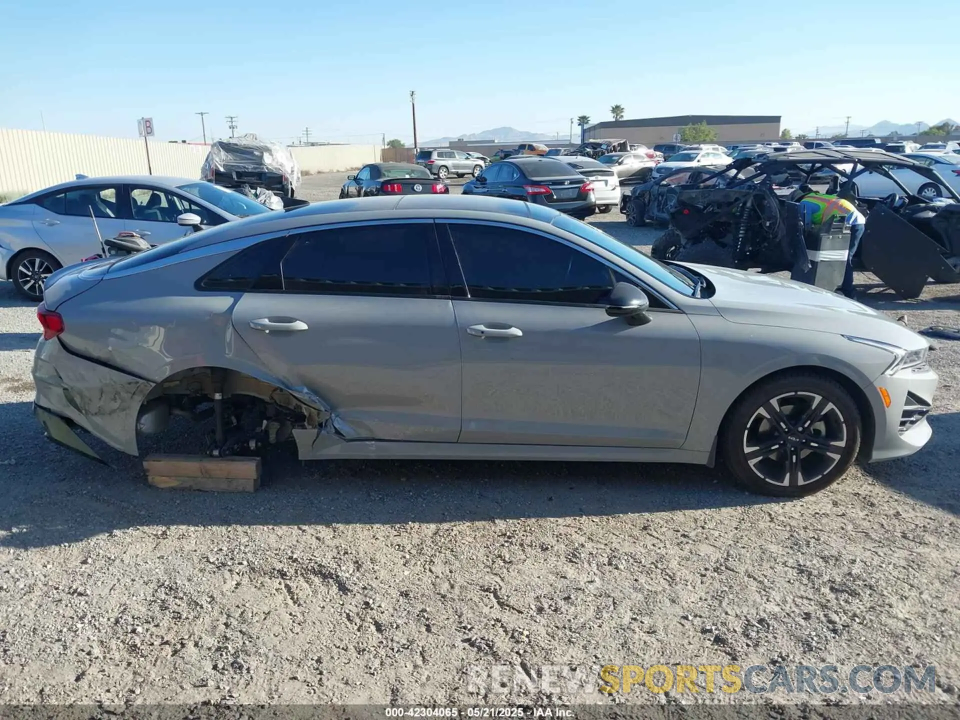 12 Photograph of a damaged car 5XXG64J25RG257817 KIA K5 2024