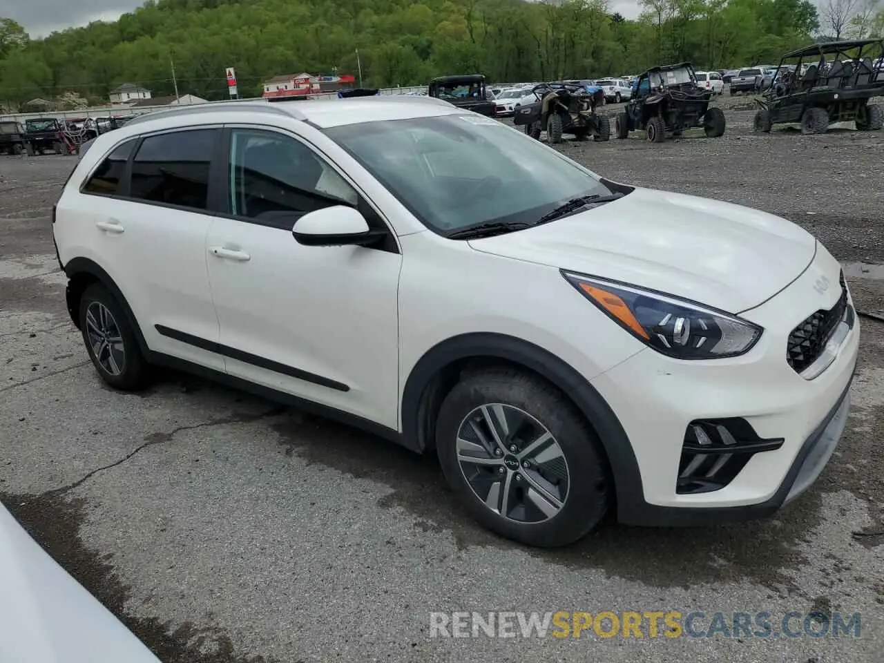 4 Photograph of a damaged car KNDCB3LC0N5549691 KIA NIRO 2022