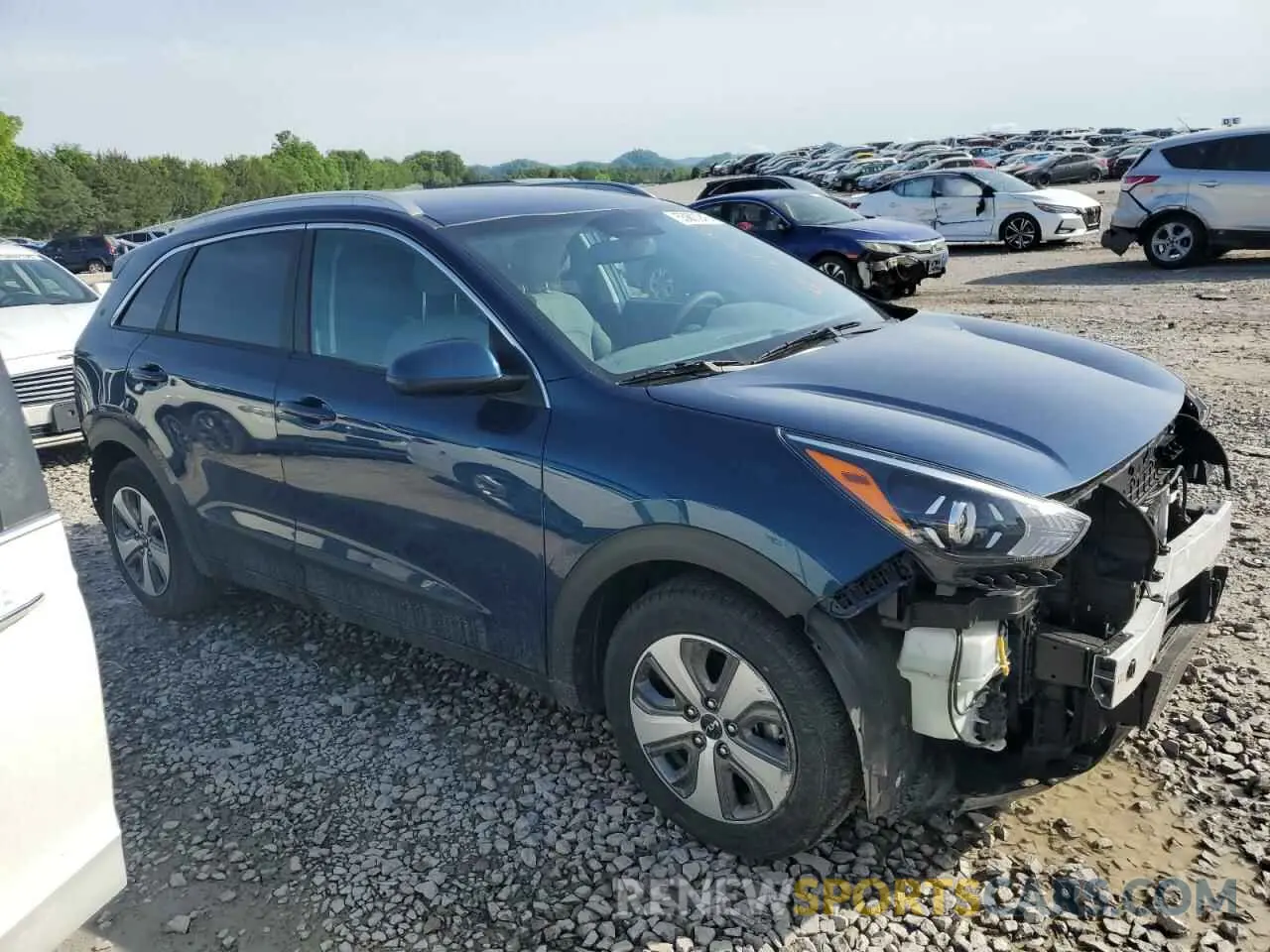 4 Photograph of a damaged car KNDCB3LC7N5532550 KIA NIRO 2022